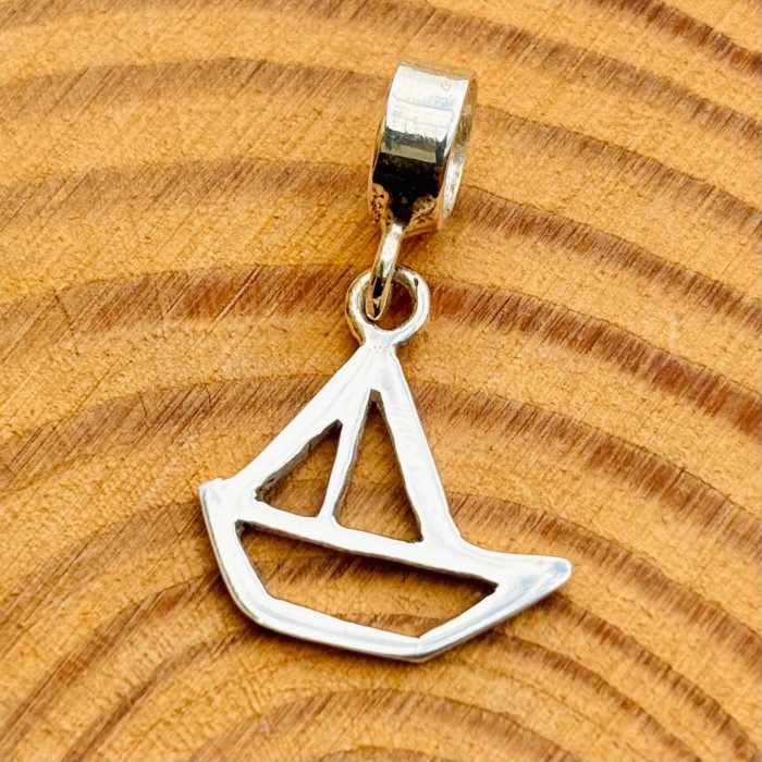 Berloque Brinquedo de Miriti Barco Vazado